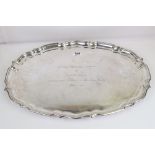 Large white metal tray, presentation inscription in French to the centre, stepped Chippendale