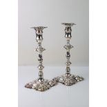 Pair of George II Rococo silver candlesticks, removeable square sconce, knopped baluster stem,