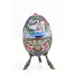 20th century Russian enamelled silver egg shaped trinket pot raised on three hoof legs, four
