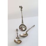 Continental white metal maidenhead spoon, the terminal modelled as a women holding wheat and