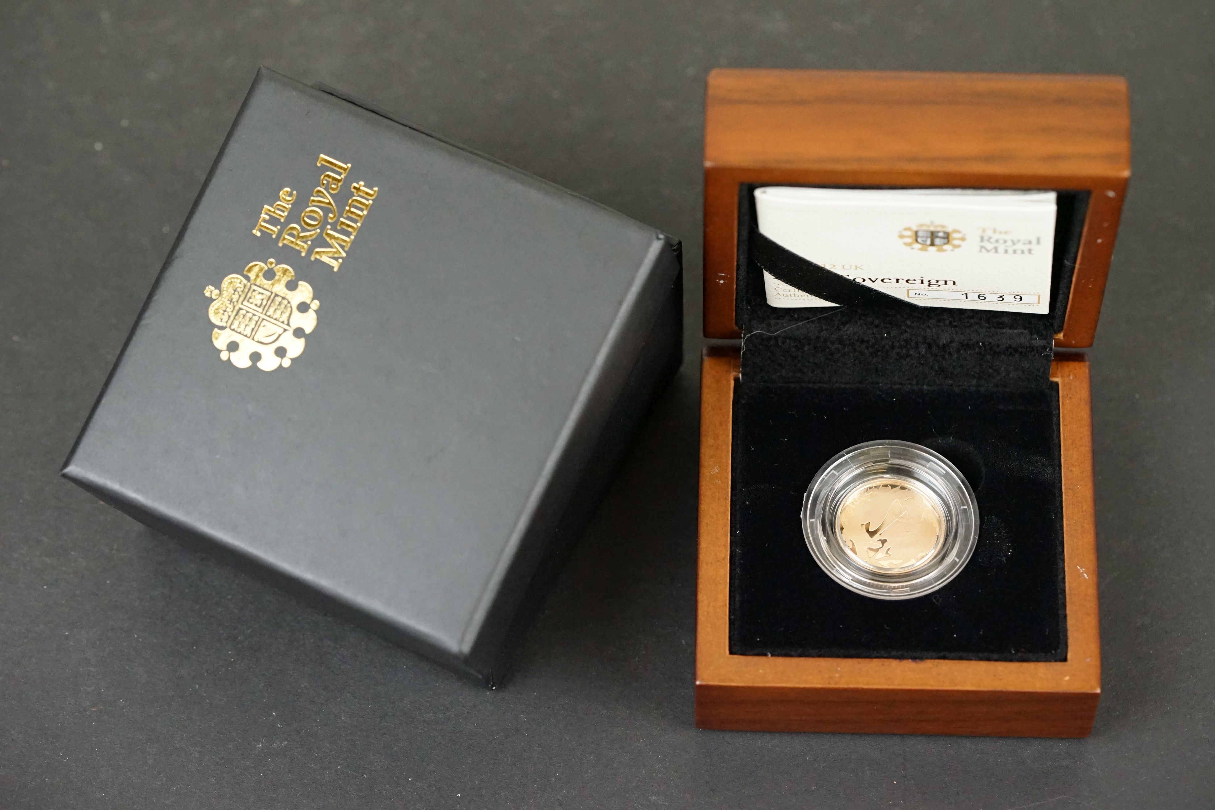 A Royal Mint 2012 UK Gold proof half sovereign coin complete with COA and presentation box.