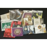A collection of thirteen Royal Mint uncirculated £5 coins to include the 2000 Millennium coin, the