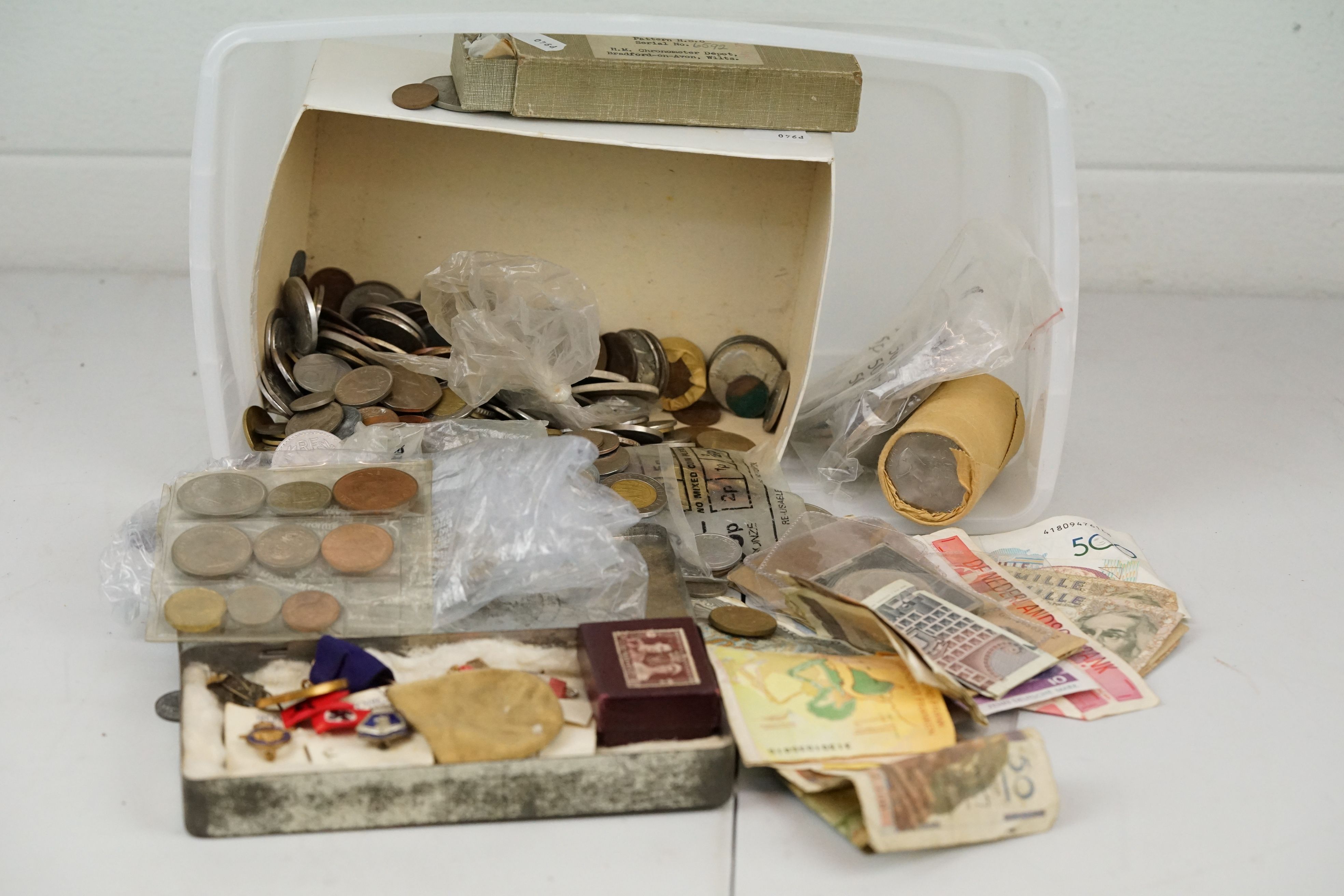 A collection of mixed mainly British pre decimal and foreign coins & banknotes to include some