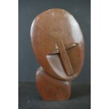 African Stone Stylized Sculpture of a Head and Shoulders, signed to base Phineas, 43cm high