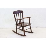 Vintage oak child's rocking chair