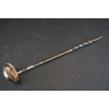 A fully hallmarked sterling silver Georgian toddy ladle with twisted wooden handle.