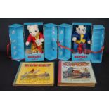 A small collection of Rupert the Bear collectables to include two story and picture books and two