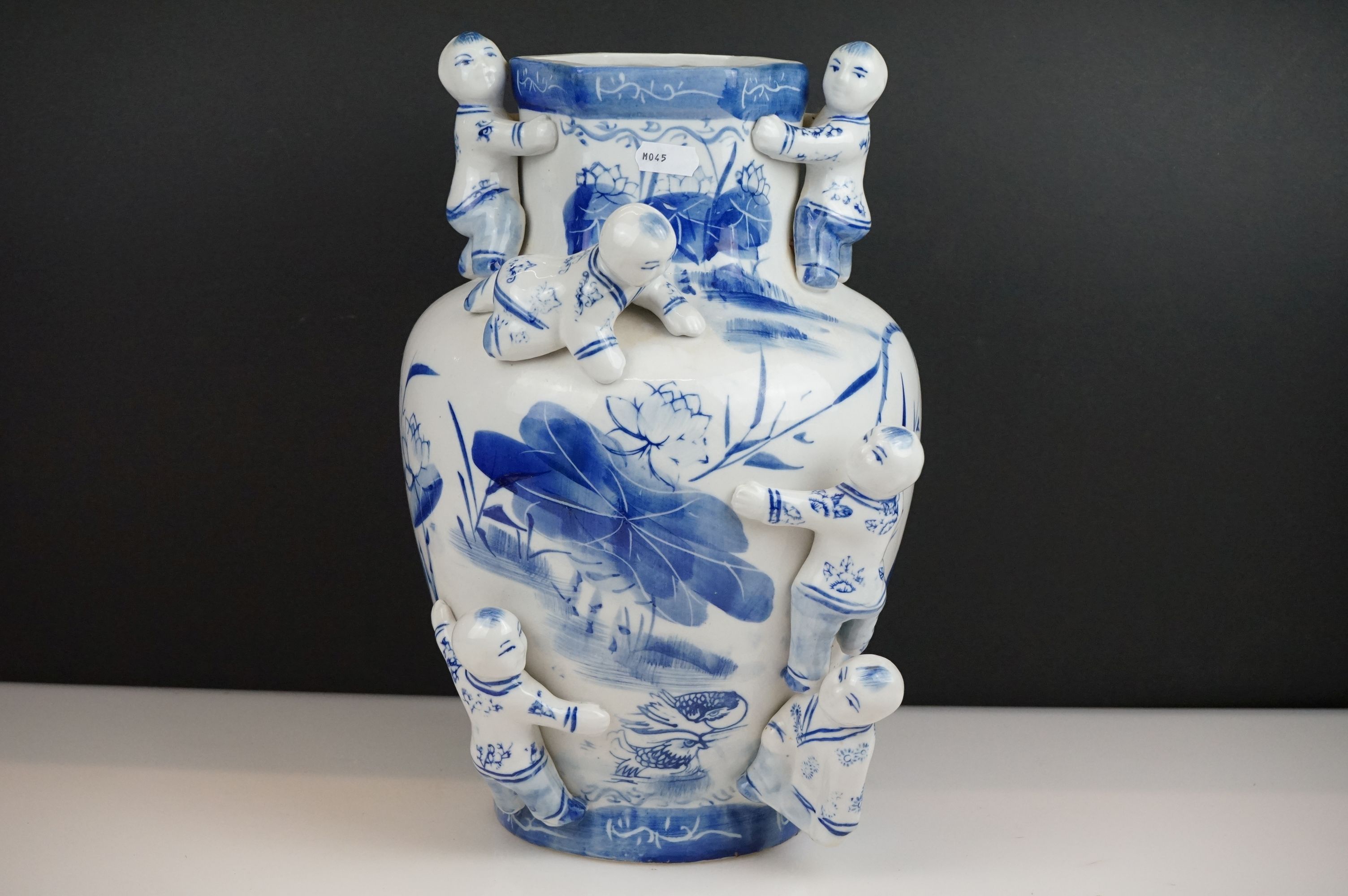 20th century Chinese Blue and White Fertility Vase applied with six climbing children, 35cm high