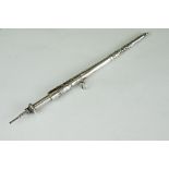 A large Sampson & Mordon white metal propelling pencil with cherub decoration.