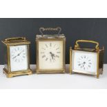 A collection of three brass cased carriage clocks to include a Smiths example.