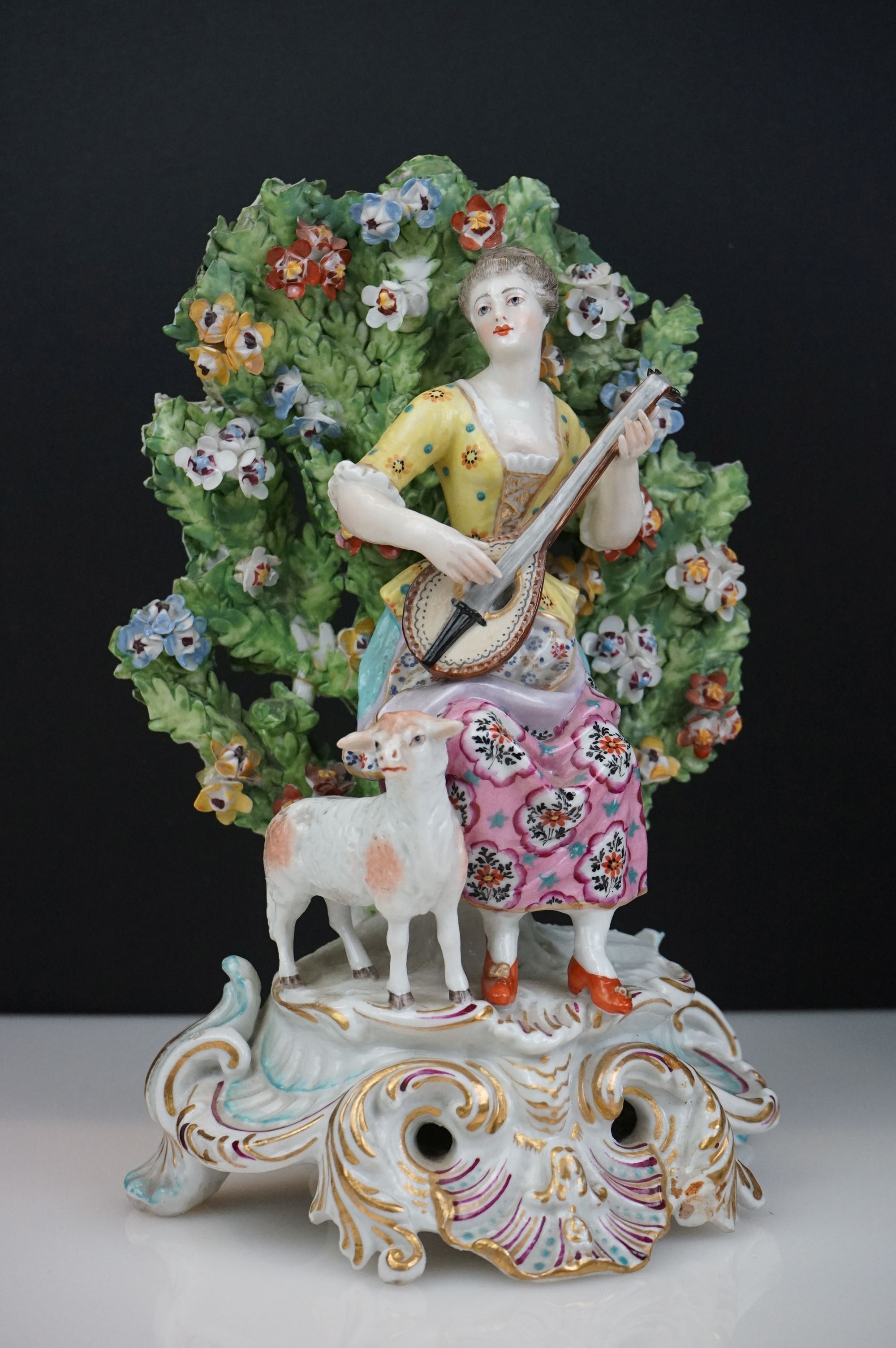 Pair of Chelsea Porcelain Bocage Figures in the form of a Man playing bagpipes with a dog and a - Image 4 of 6