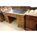 Late Victorian Oak Twin Pedestal Desk with black leather inset top over an arrangement of nine