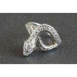 Silver and CZ snake ring set with marcasite and ruby eyes