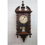 Victorian Walnut and Pine Cased 8 day Hanging Wall Clock with enamel and brass dial, with pendulum