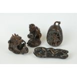 A collection of four hand carved Chinese Netsuke.