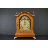 An early 20th century wooden cased chiming bracket clock, brass face with subsidiary dial,