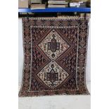 Iranian Blue and Cream Ground Wool Rug decorated with two diamonds of geometric patterns, 152cm x