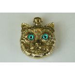 18ct gold plated perfume bottle in the form of Louis Wain with turquoise eyes