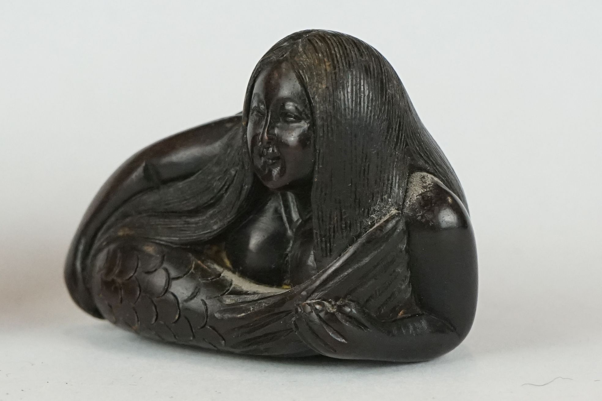 A collection of four Chinese carved wooden netsuke of figural form to include a Mermaid and a - Image 2 of 17