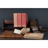 A box of mixed collectables to include two wooden book ends, a desk top book shelf and Charles