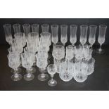 Collection of crystal cut glassware to include 11 champagne flutes, 6 red wine glasses, 6 white wine