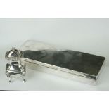 A silver plated "State Express Cigarettes" box together with a silver plated pepper shaker.