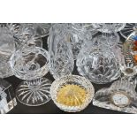 Collection of mostly cut glassware to include 5 decanters with stoppers, a large vase, large fruit