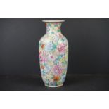 Chinese Porcelain thousand flowers Baluster Vase, red ground Qianlong mark to base drilled