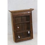 19th / Early 20th century Pine Hanging Wall Cabinet, the single glazed door opening to two