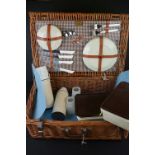 A Brexton wicker picnic basket / hamper complete with contents.