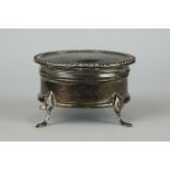 A fully hallmarked sterling silver three footed trinket box with hinged lid.