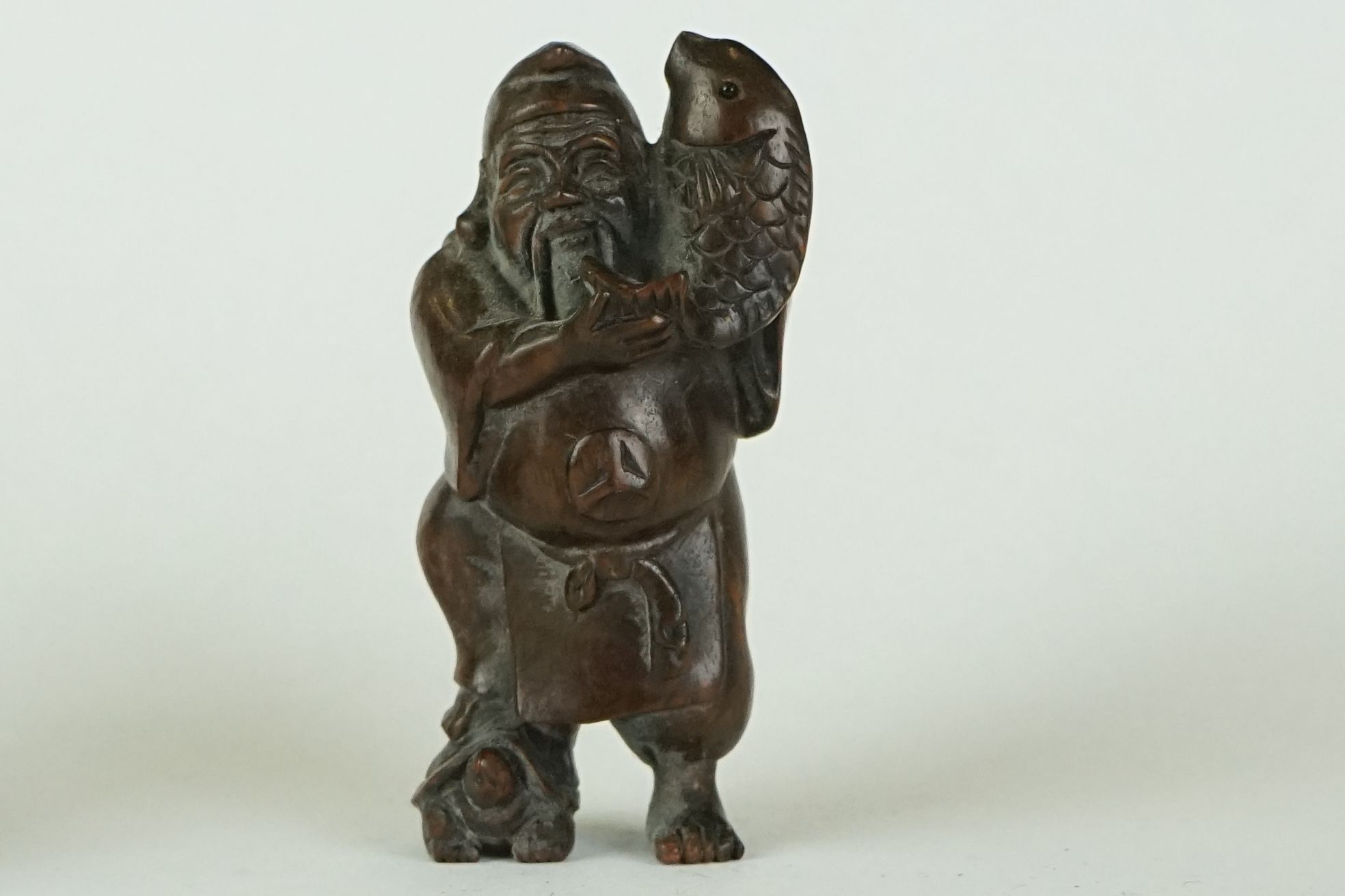 A collection of four Chinese carved wooden netsuke of figural form to include a Mermaid and a - Image 10 of 17