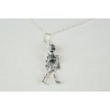 Silver skeleton pendant necklace on silver chain