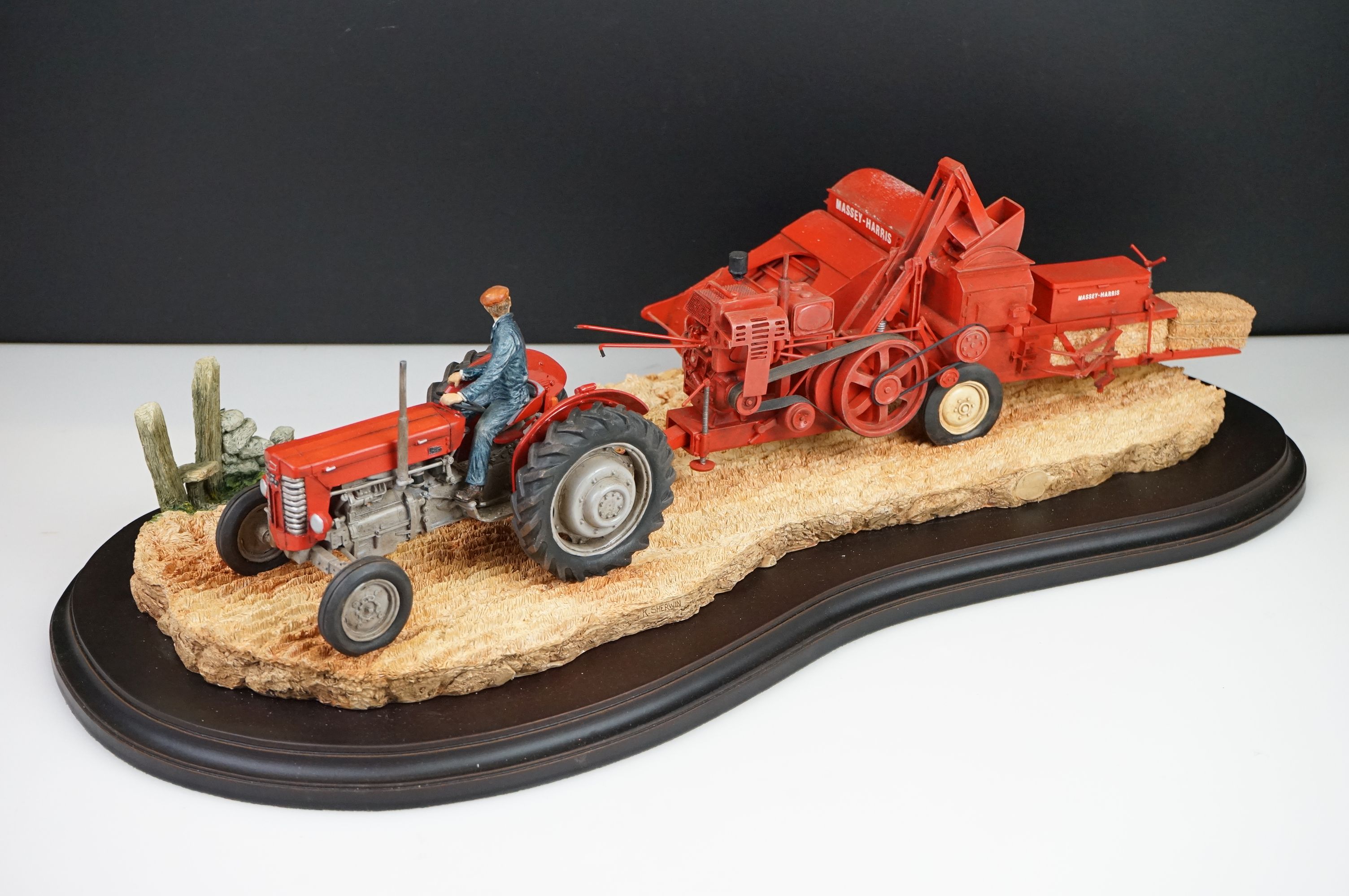 Country Artists Model of a Hay Baling titled ' Safely gathered in ' by Keith Sherwin on a wooden