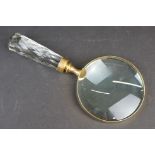 Brass cased handheld magnifying glass