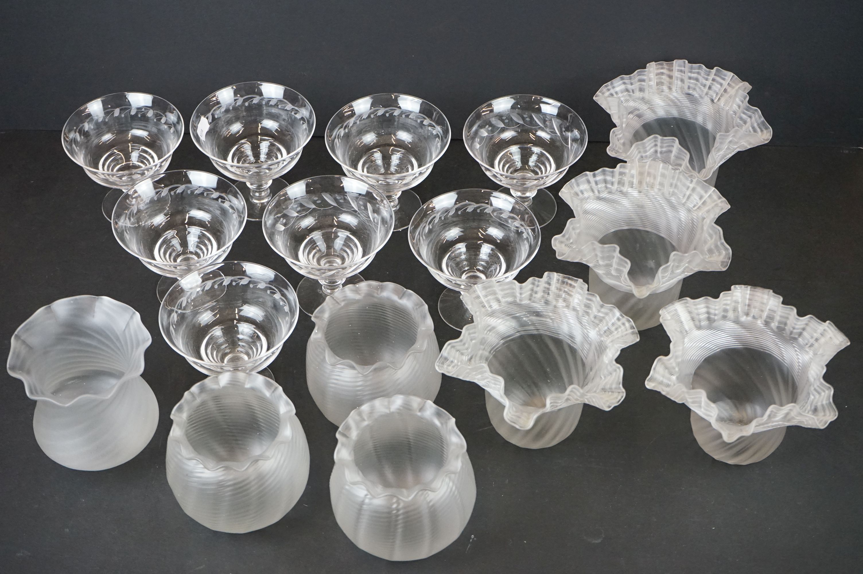 Eight Stuart Crystal footed trifle dishes with an etched design (Rd np. 681649) together with