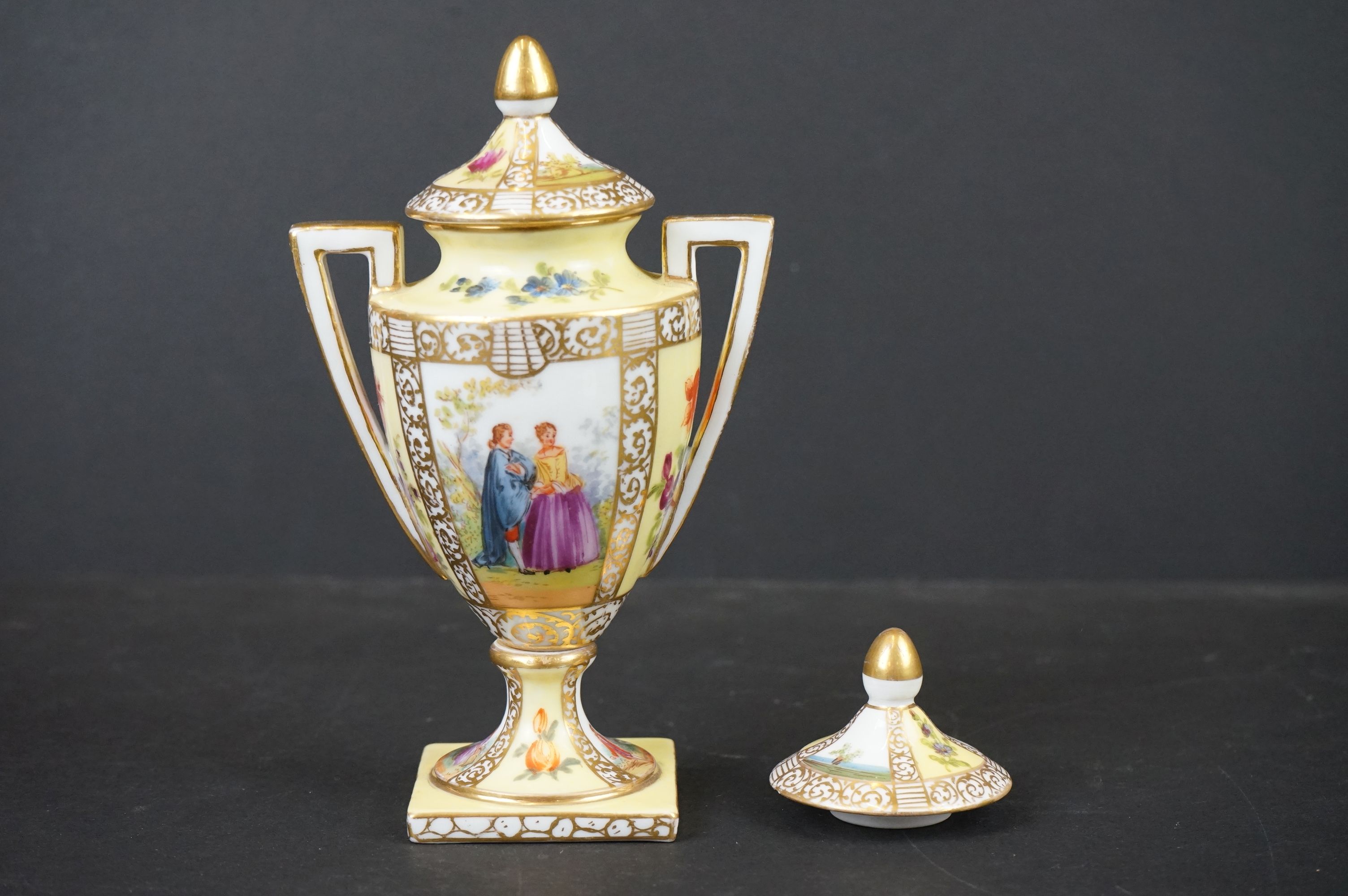 Dresden Porcelain Lidded Urn decorated with hand painted panels of classical figures and flowers, in