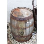 A vintage wooden coopered barrel, stands approx 54cm in height.