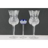 A pair of Edinburgh crystal thistle wine glasses together with a liquor glass.