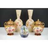Pair of Bone China Lidded Jars decorated with fruits with gilt handles, signed JAS 15cm high