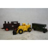 Two wooden scratch built vehicles to include a truck and train together with a Tonka digger.