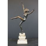 Art Deco Naked Dancing Girl Figurine mounted on a stepped marble base, 42cm high