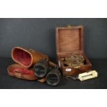 A small group of collectables to include a pair of field binoculars, a cased compass and a set of