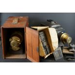 Two antique magic lantern projector's complete with lenses together with a collection of glass