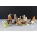 Seven porcelain bird ornaments to include a Beswick 2308 Song Thrush, Goebel Chaffinch, Raybur