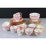 Minton Pink Cockatrice, pattern 9646, tea ware to include 10 teacups (4 a/f), milk/cream jug,
