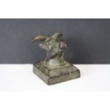 A bronze seal in the form of a rams head, approx 4cm in height.