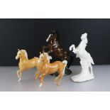 Three Beswick Horses to include a 1014 rearing horse and 2 x 1261 prancing Palomino Arab horses (1