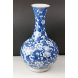 Chinese Porcelain Blue and White Prunus Blossom Bottle Vase, six Kangxi marks to base, 41cm high (