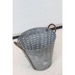 A vintage metal oyster trug.